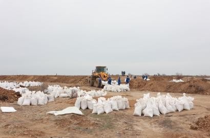 Embamunaigas JSC involved actively in flood control and assistance to the population of Atyrau region